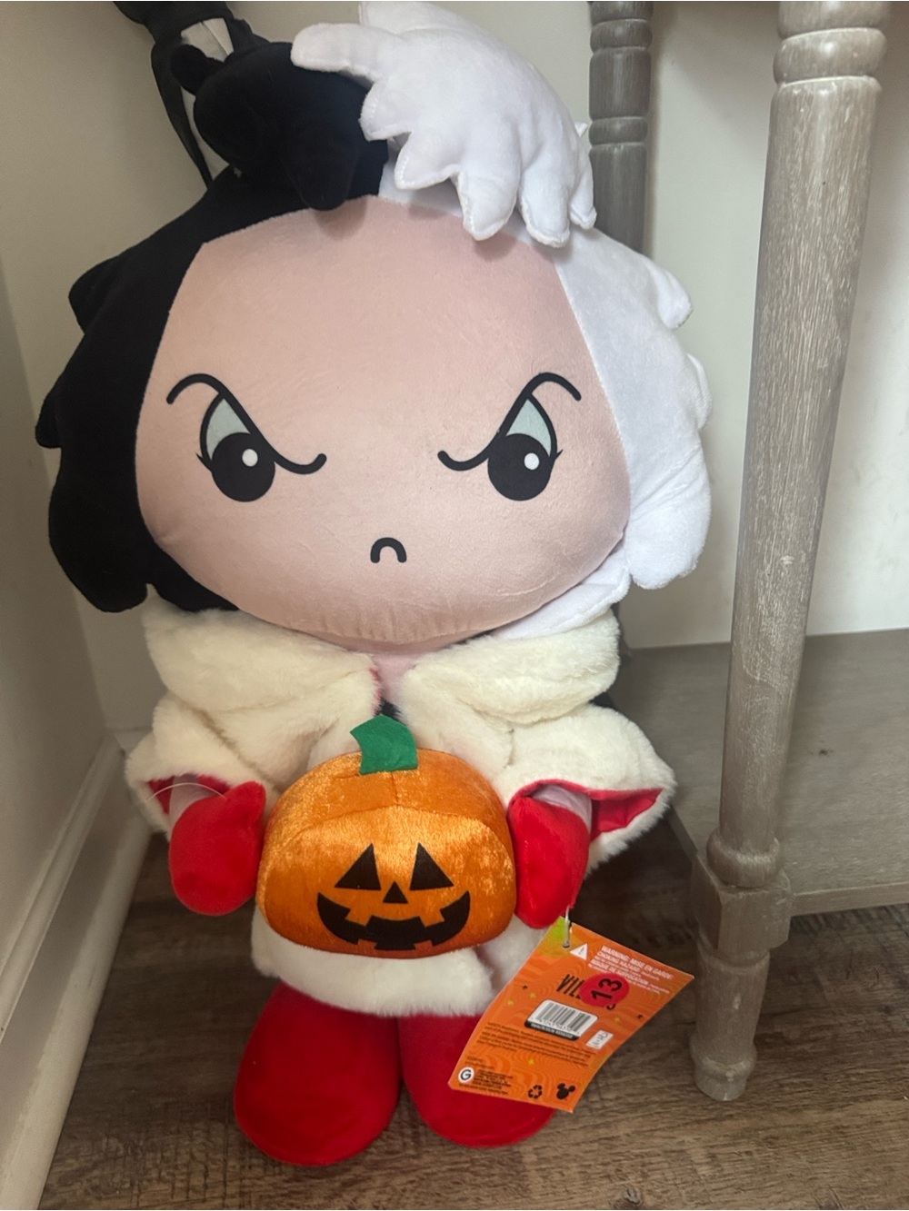 Disney Black-and-White Cruella door greeter with Orange Pumpkin